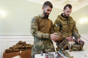 Medical volunteers unpack individual first aid kits similar to those used by NATO during a ceremony where they were donated by Kiev's Mayor Vitaly Klitschko in Kiev