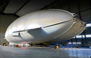 Airlander 50 in her hanger in Bedfordshire Pixs info Sara Oliver with airship. Copyroght Photo by Les Wilson Les@leswilson.com 25th.Feb 2016