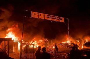 Fire rages following an Israeli strike in an area designated for displaced Palestinians in Rafah on May 26, 2024. Reuters TV/Reuters